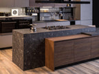 Urban Kitchens by ORDER Kitchen Furniture features custom cabinetry, a marble island, and built-in stovetop, blending warm wood with dark stone for a chic contemporary look in any modern Yerevan home.