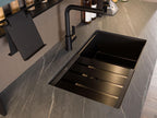 The Urban Kitchens sink by ORDER Kitchen Furniture features a matte black faucet, black slatted cover, and gray stone countertop with spice jars—ideal for Yerevan’s sleek, custom urban kitchens.